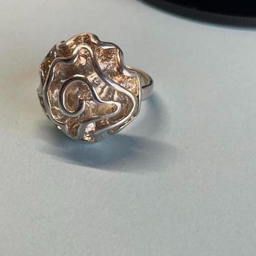 Sterling silver ring with intricate